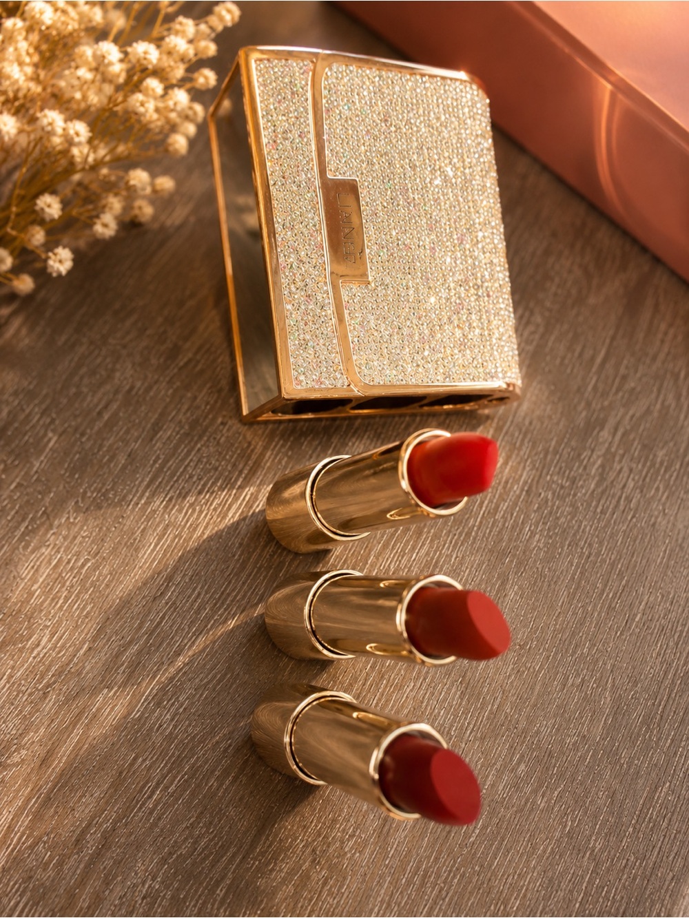 Glamorous Gold Lipstick Trio in Red Shades